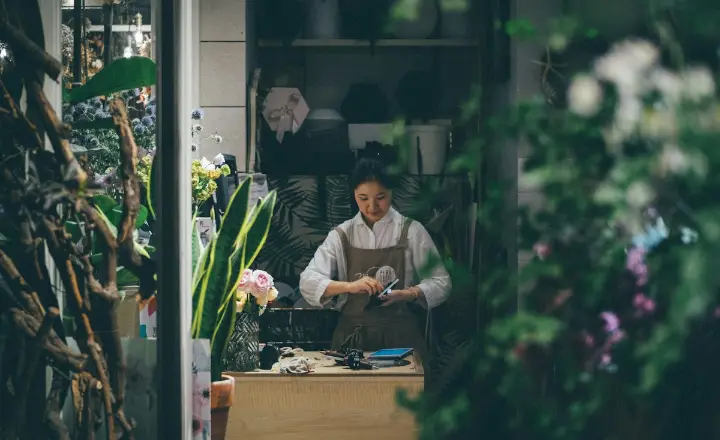 Small business owner at work in her shop